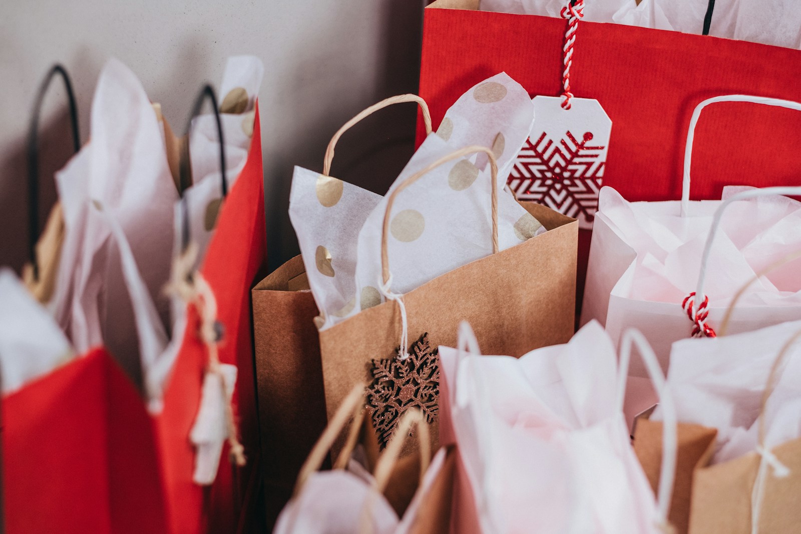shallow focus photography of paper bags shopping before money diet